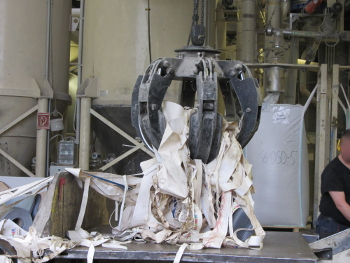 Workers sort the PVC waste and separate it from foreign materials.