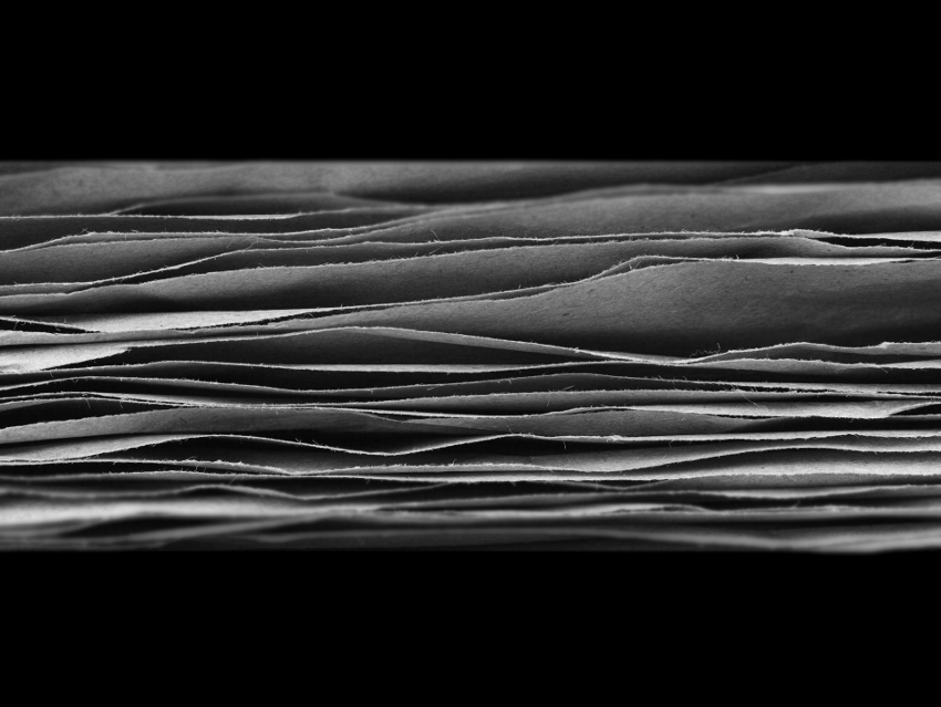 Light-Induced Ion Transport through Graphene Oxide Membranes