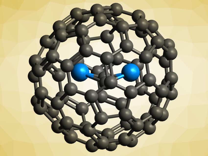 Diuranium Carbide Cluster Inside a Fullerene